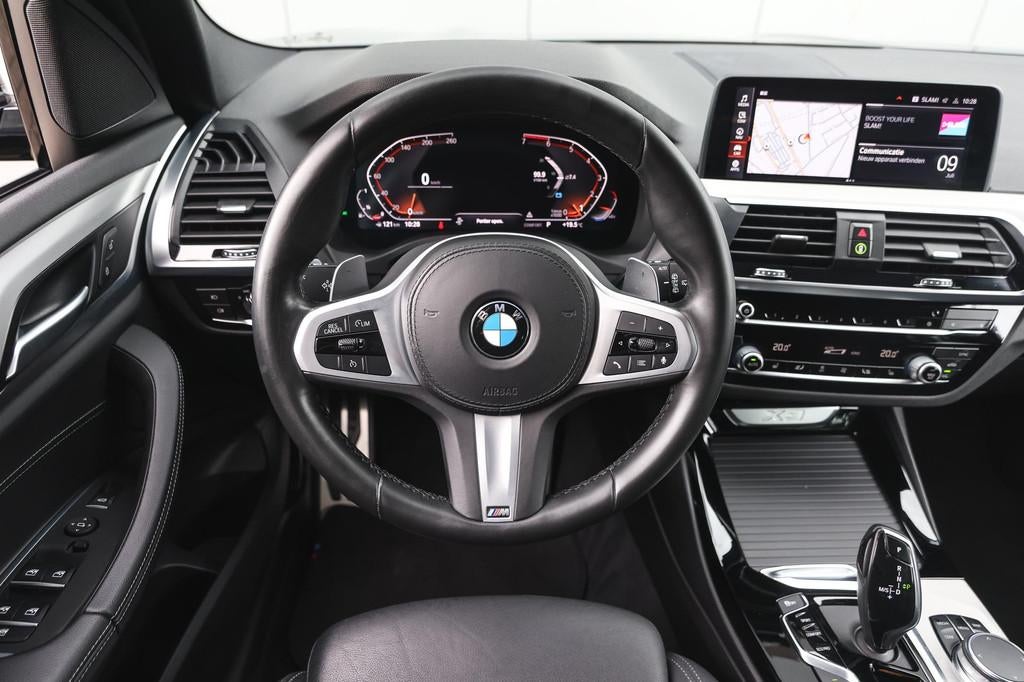 BMW X3 xDrive20i High Executive M Sport Automaat / Trekhaak, Auto's, BMW, 1998 cc, Gebruikt, 4 cilinders, Zwart