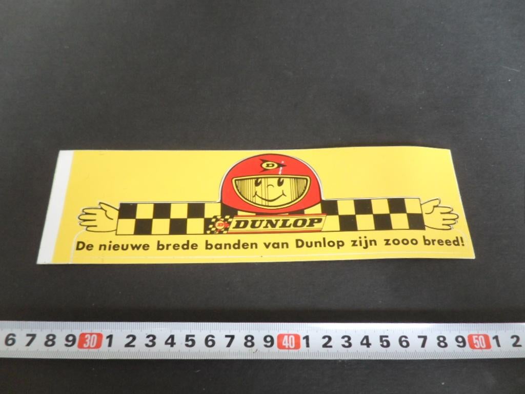 sticker DUNLOP De nieuwe brede banden zijn zooooo breed !, Verzamelen, Ophalen, Zo goed als nieuw
