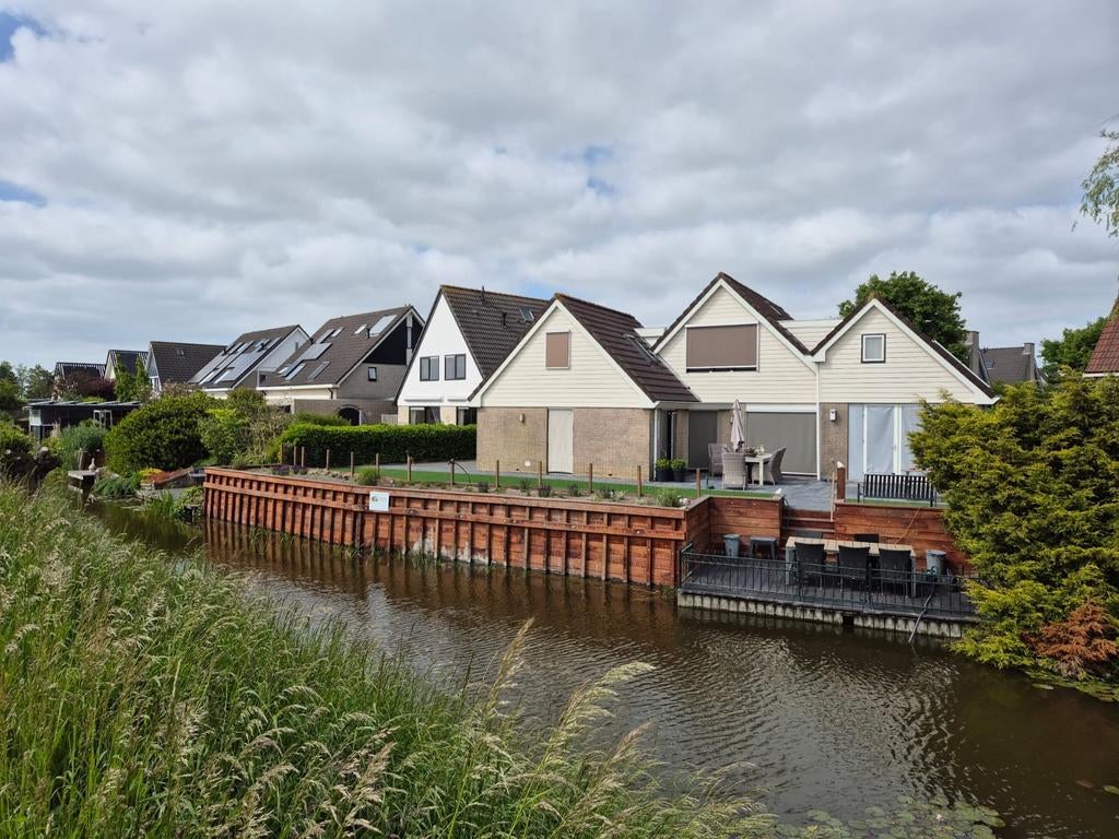Tuin leeghalen, beschoeiingen, graszoden bestraten onderhoud, Bestrating