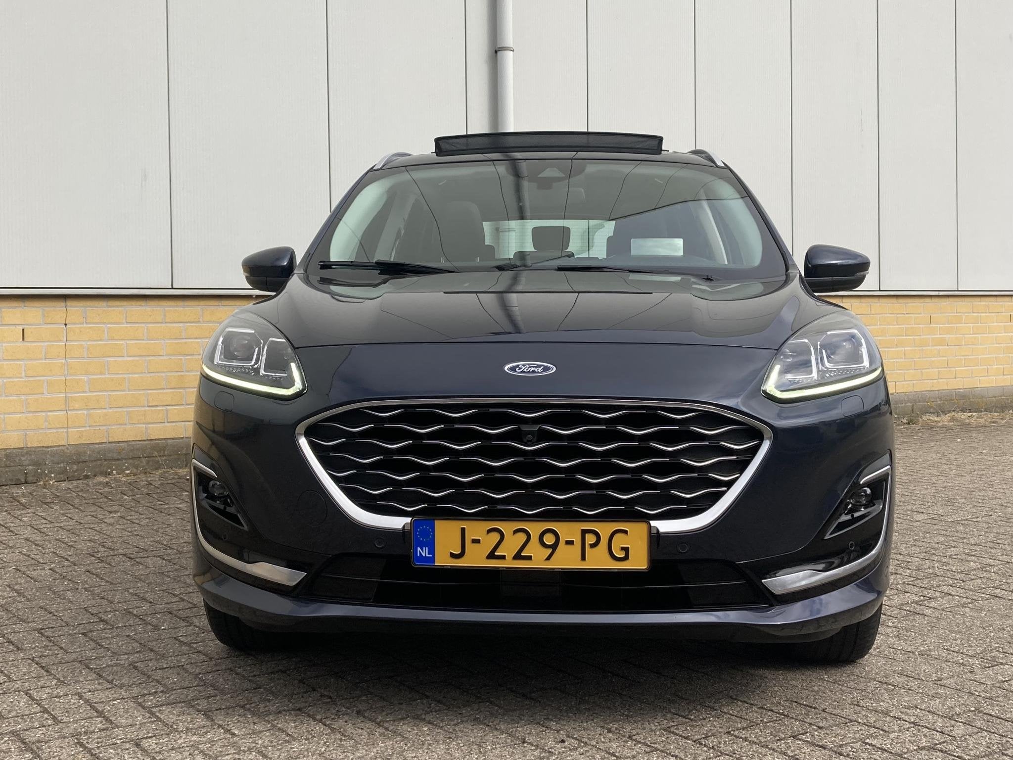 Ford Kuga 2.5 PHEV 225 pk Vignale Headup Display - Panoramad, Auto's, Lichtsensor, 14 kWh, Gebruikt, 4 cilinders