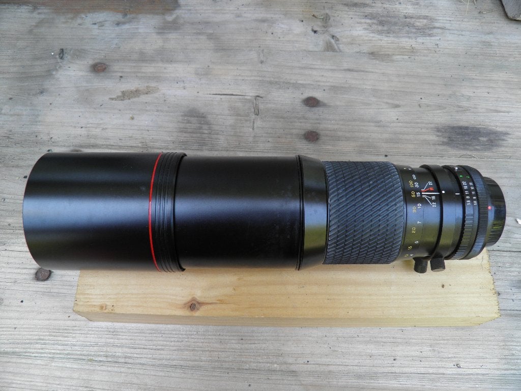 Lens tokina sd 400 mm deze lens past op de canon ae1, Ophalen of Verzenden, Zo goed als nieuw, Telelens
