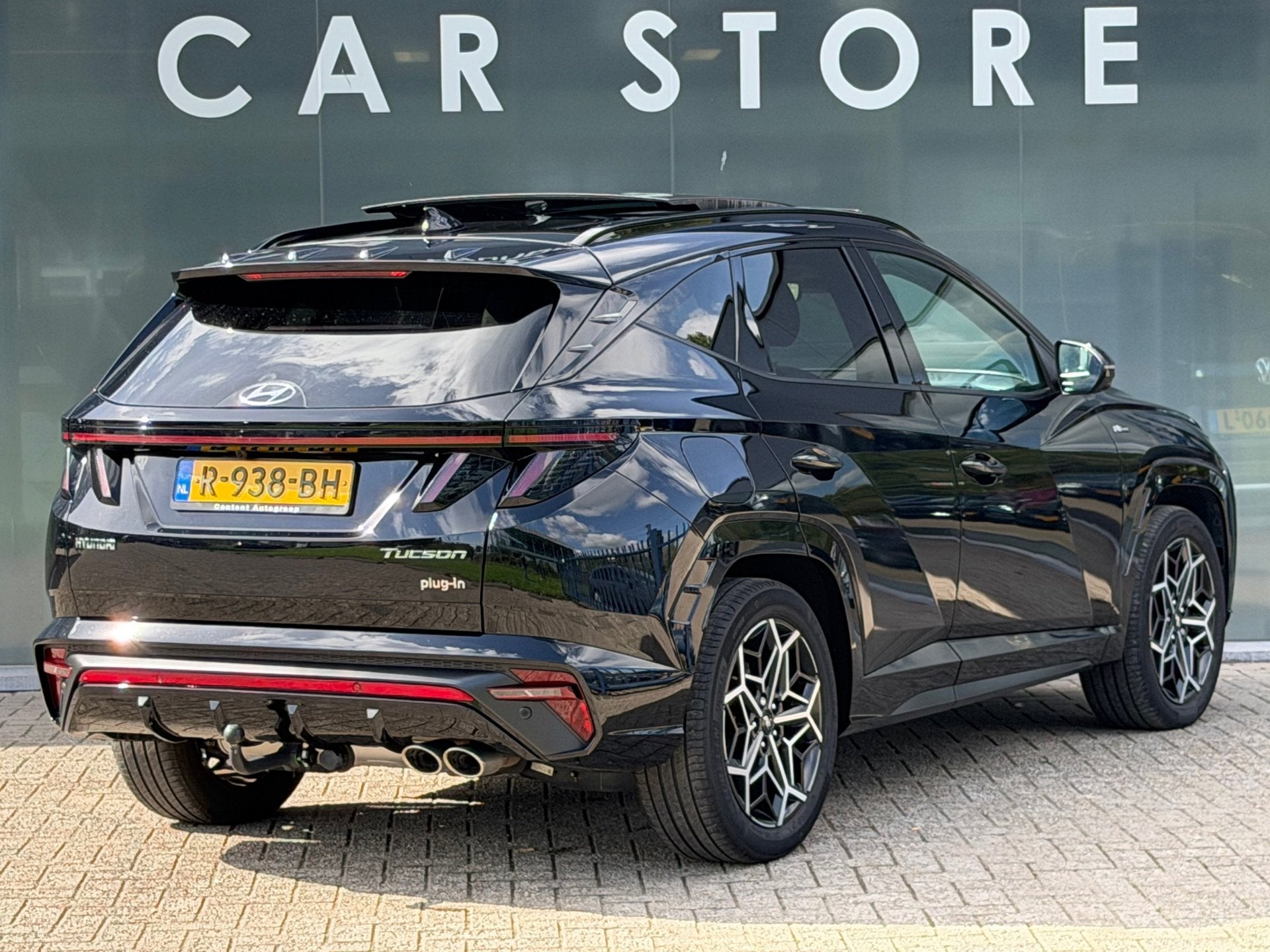 Hyundai Tucson 1.6 T-GDI PHEV N Line Sky 4WD PANO/TREKHAAK/N, Auto's, Automaat, Gebruikt, 4 cilinders, Zwart