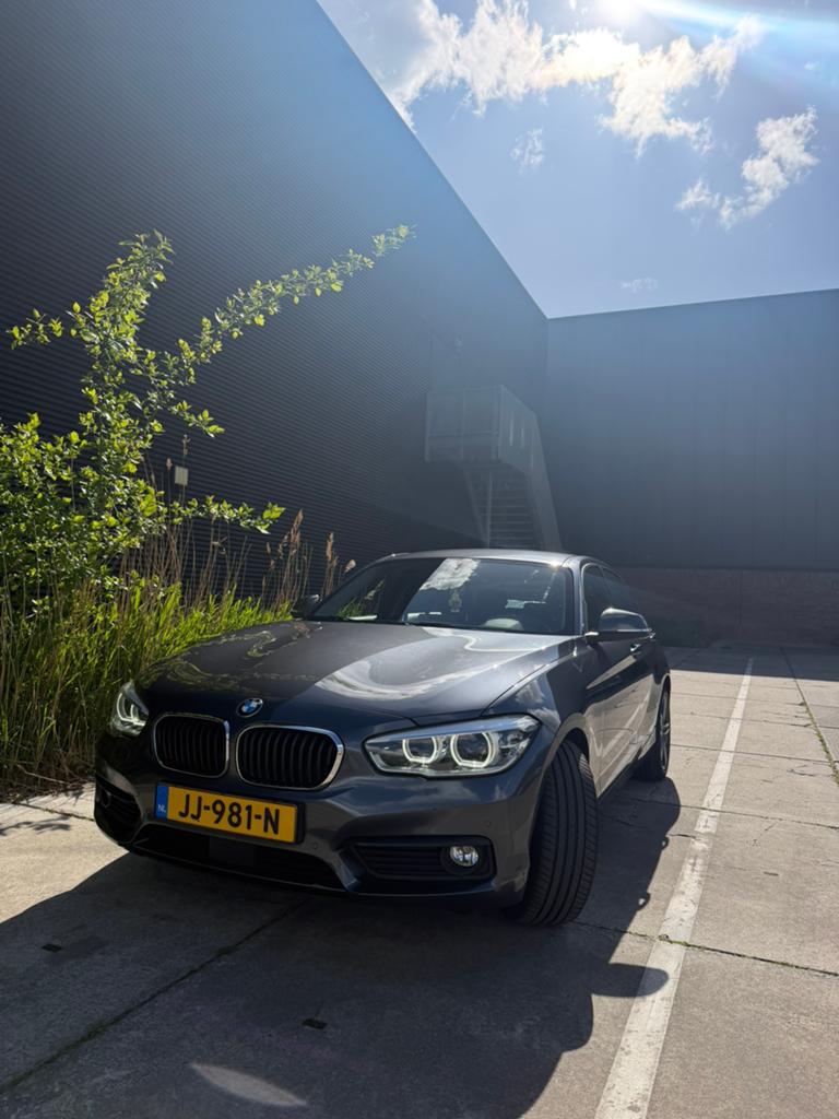 BMW 1-Serie 118i 136pk EDE Aut 2016 Grijs, 4 cilinders, Origineel Nederlands, Particulier, 695 kg