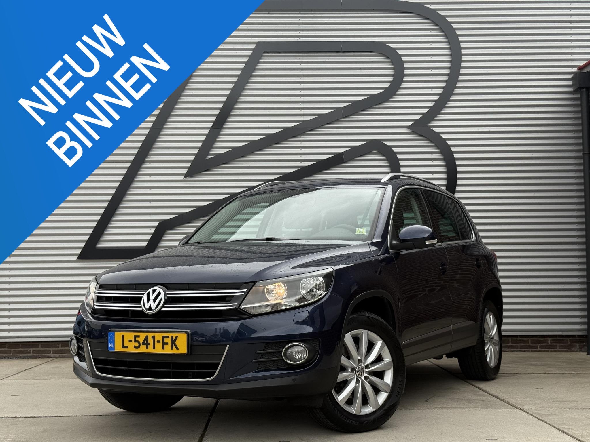 Volkswagen Tiguan 1.4 TSI Sport&Style 2e Eigenaar|Navi|Leder, Auto's, Voorwielaandrijving, Euro 5, Gebruikt, Zwart
