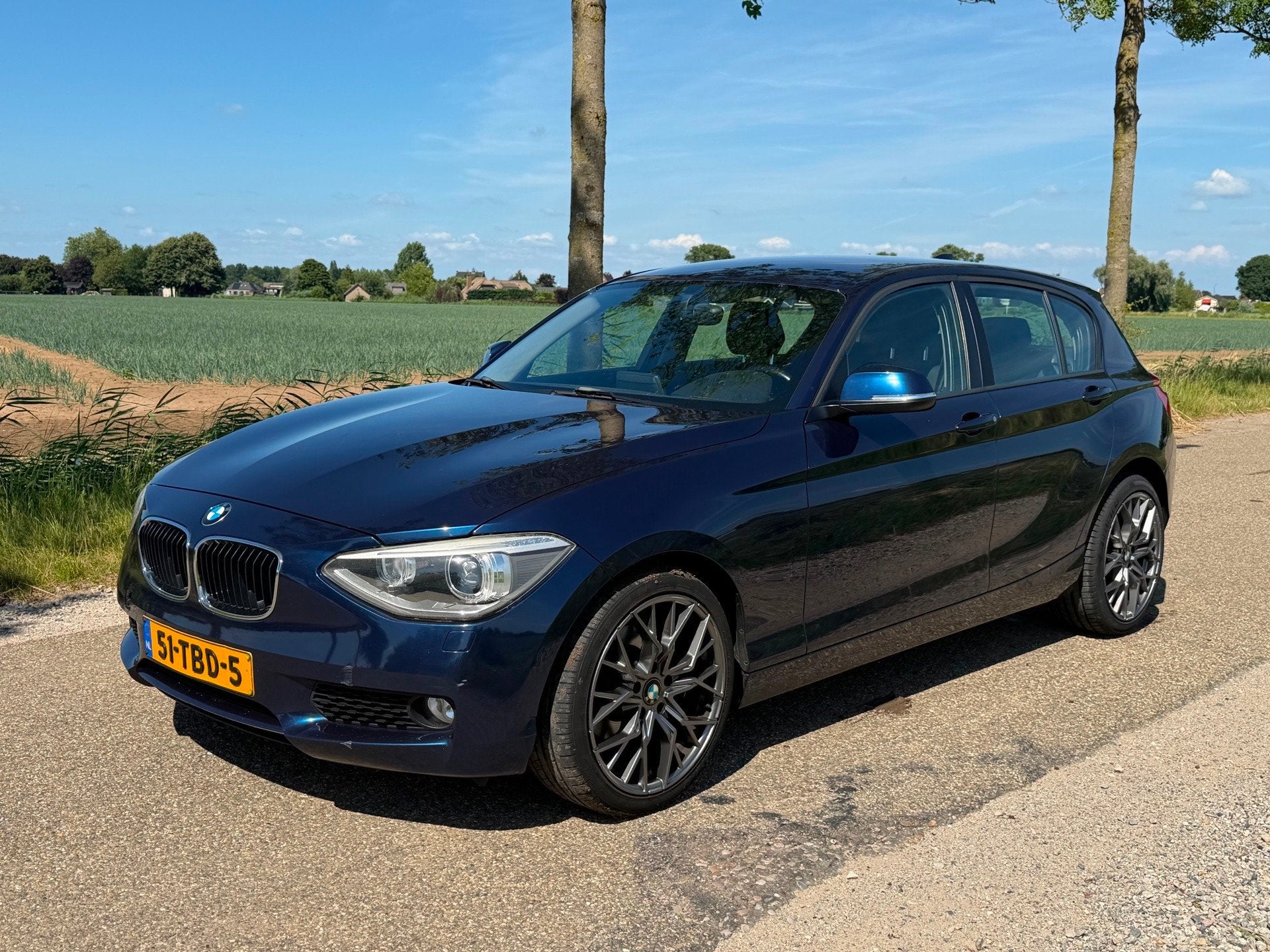 BMW 1-serie 118i Business AUT APK 06-2027 NAP Airco, Auto's, BMW, Euro 5, Gebruikt, Zwart, 4 cilinders