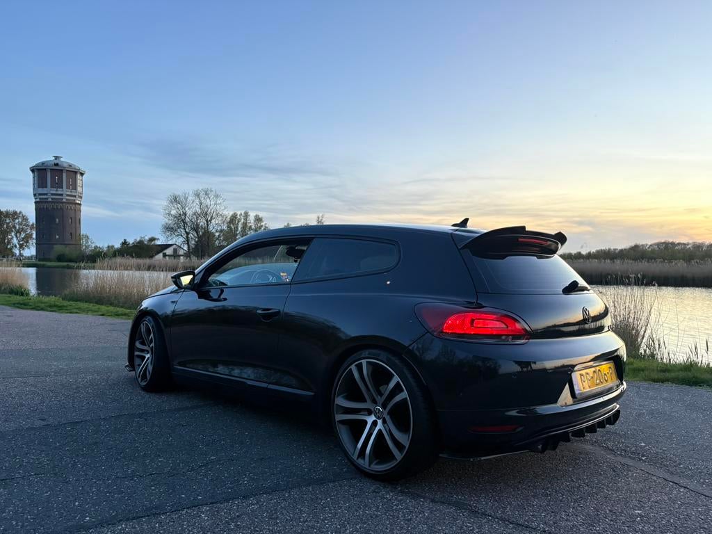 Volkswagen Scirocco 2.0 TSI DSG 2009 zomerset winterset, Auto's, 1984 cc, 4 stoelen, Zwart, Particulier