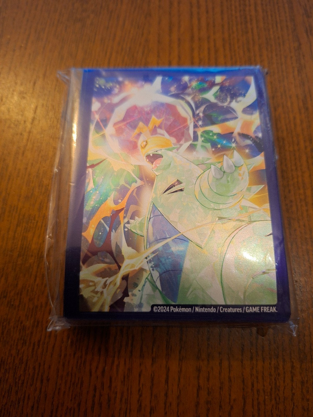 Pokémon sleeves Stellar Terastal Tyranitar, Ophalen of Verzenden, Nieuw, Sleeves of Kaarthoesjes