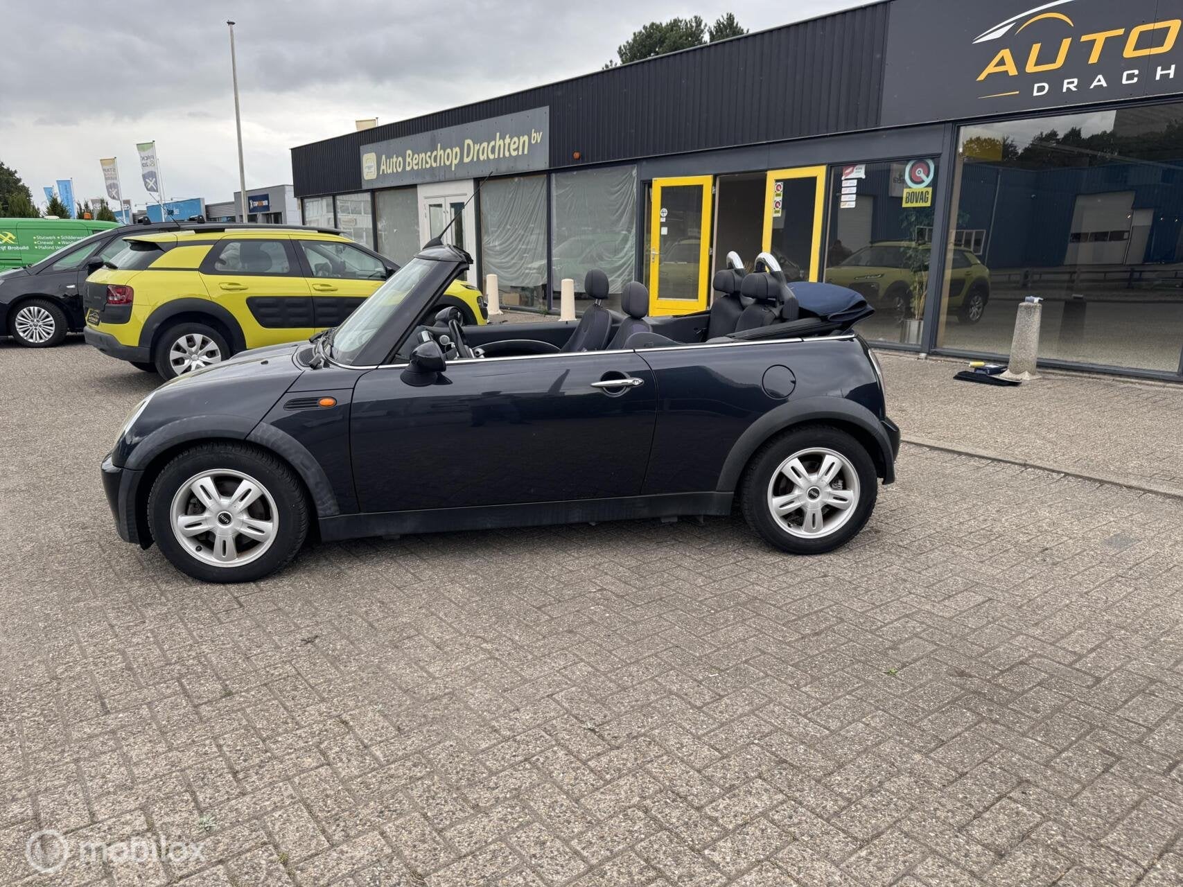 Mini Cabrio 1.6 Cooper automaat airco lm velgen 89746 km, Auto's, Dealer onderhouden, Stof, Gebruikt, Zwart
