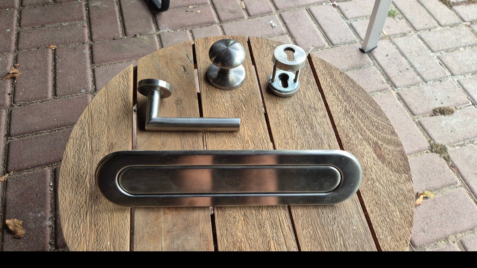 RVS voordeurbeslag set, Ophalen