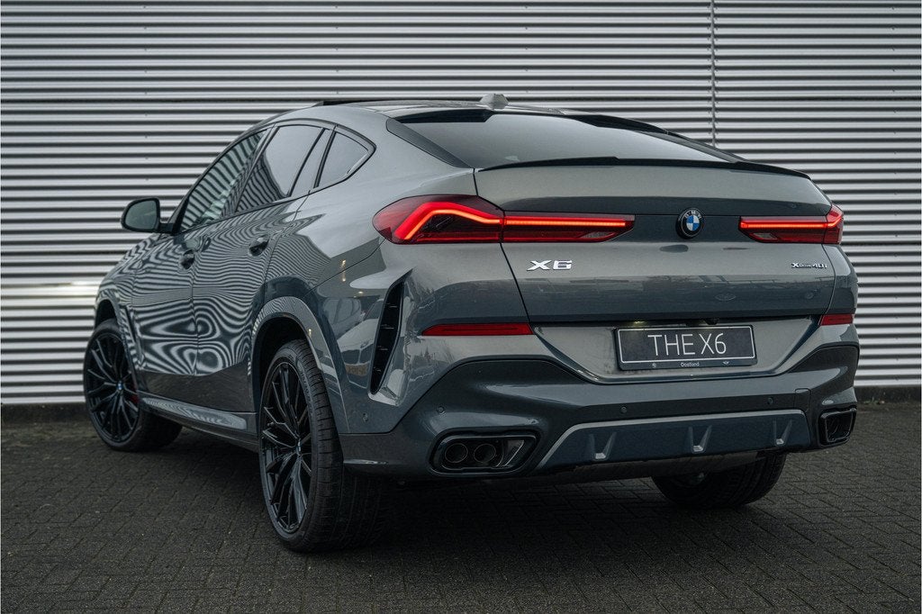 BMW X6 xDrive40i M Sport Automaat / Panoramadak / Trekhaak /, Auto's, BMW, Automaat, Zwart, Bedrijf, 2998 cc