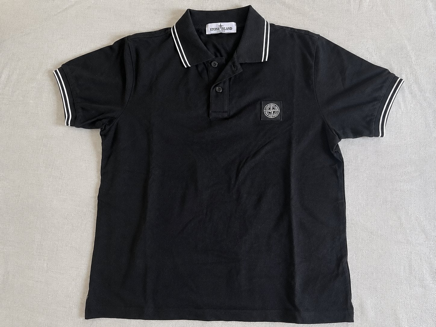 Stone Island Junior Polo Zwart - Zo goed als nieuw, Kinderen en Baby's, Ophalen of Verzenden, Zo goed als nieuw, Jongen of Meisje