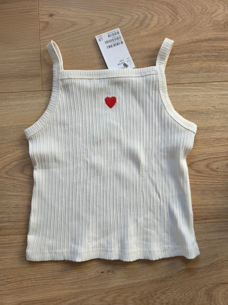 Topje H&M, maat 122-128. Nooit gedragen, Kinderen en Baby's, Kinderkleding | Maat 122, Meisje, H&M, Nieuw, Ophalen of Verzenden