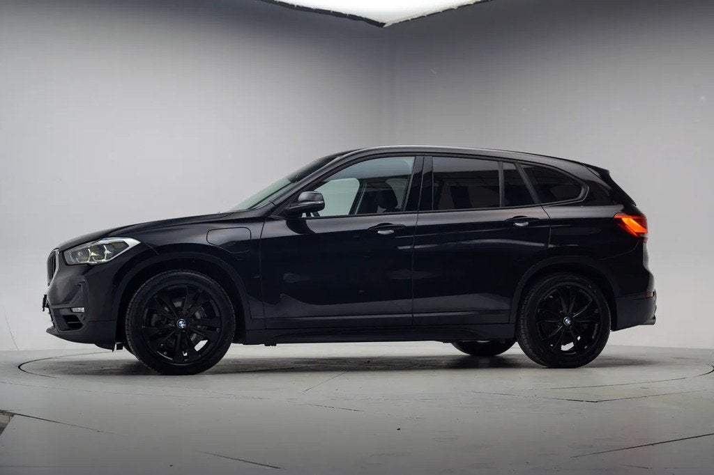 BMW X1 xDrive 25e Executive Aut. [ LED Navi prof. Stoelverwa, Auto's, Gebruikt, 750 kg, Zwart, Bedrijf