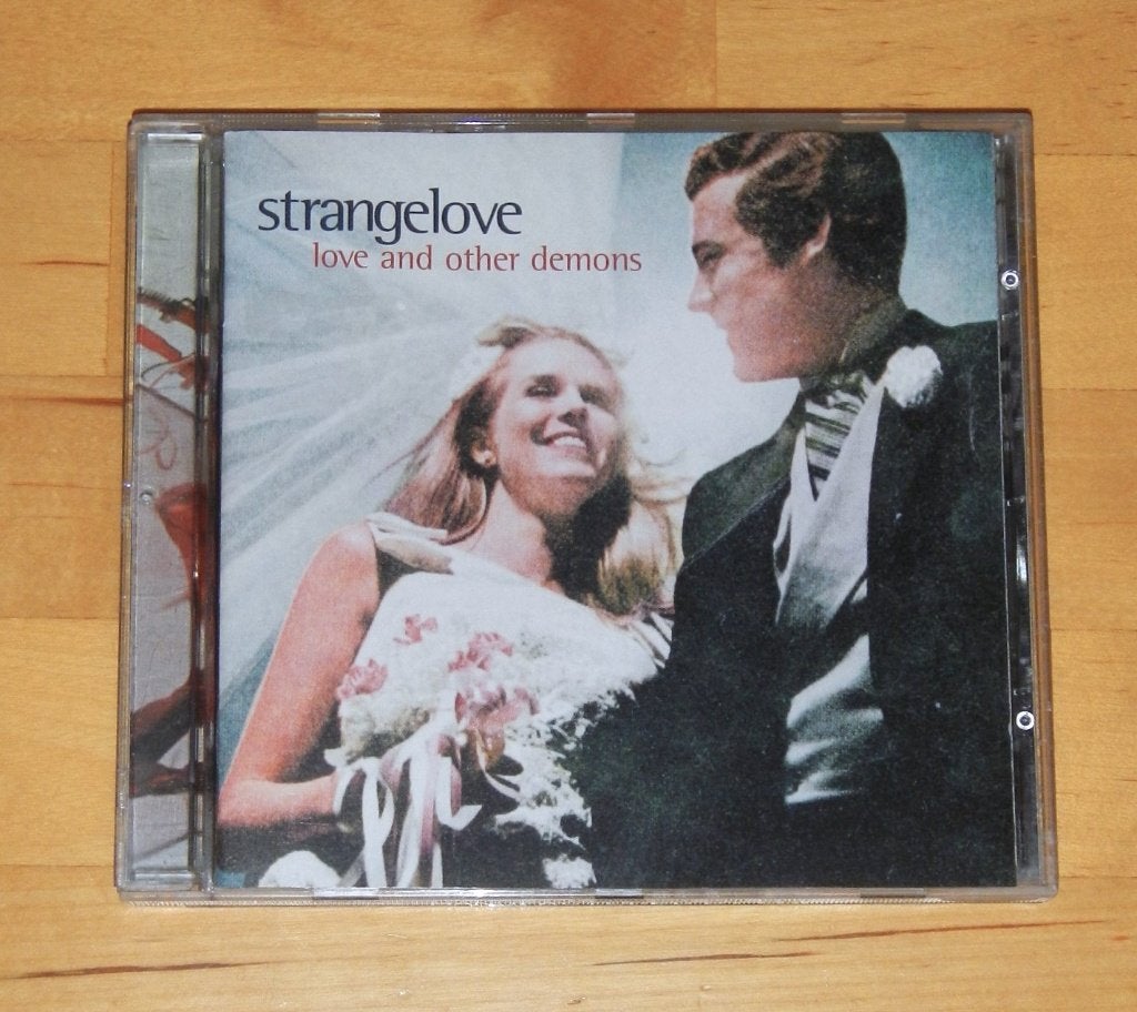 CD - Strangelove ‎– Love And Other Demons - Britpop, Verzenden, Zo goed als nieuw, Poprock