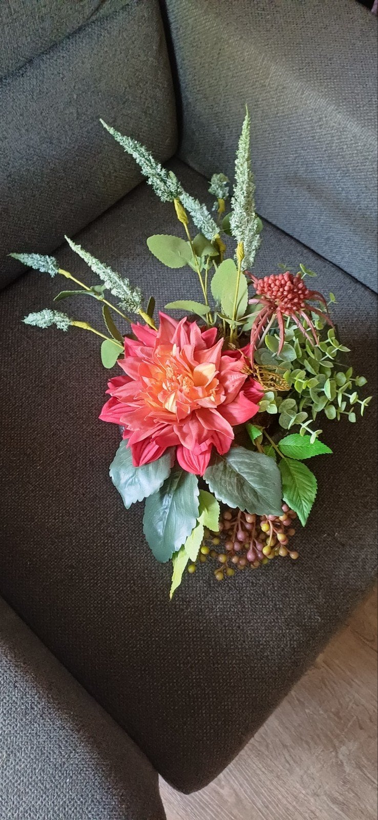 zijden bloemstuk, Ophalen