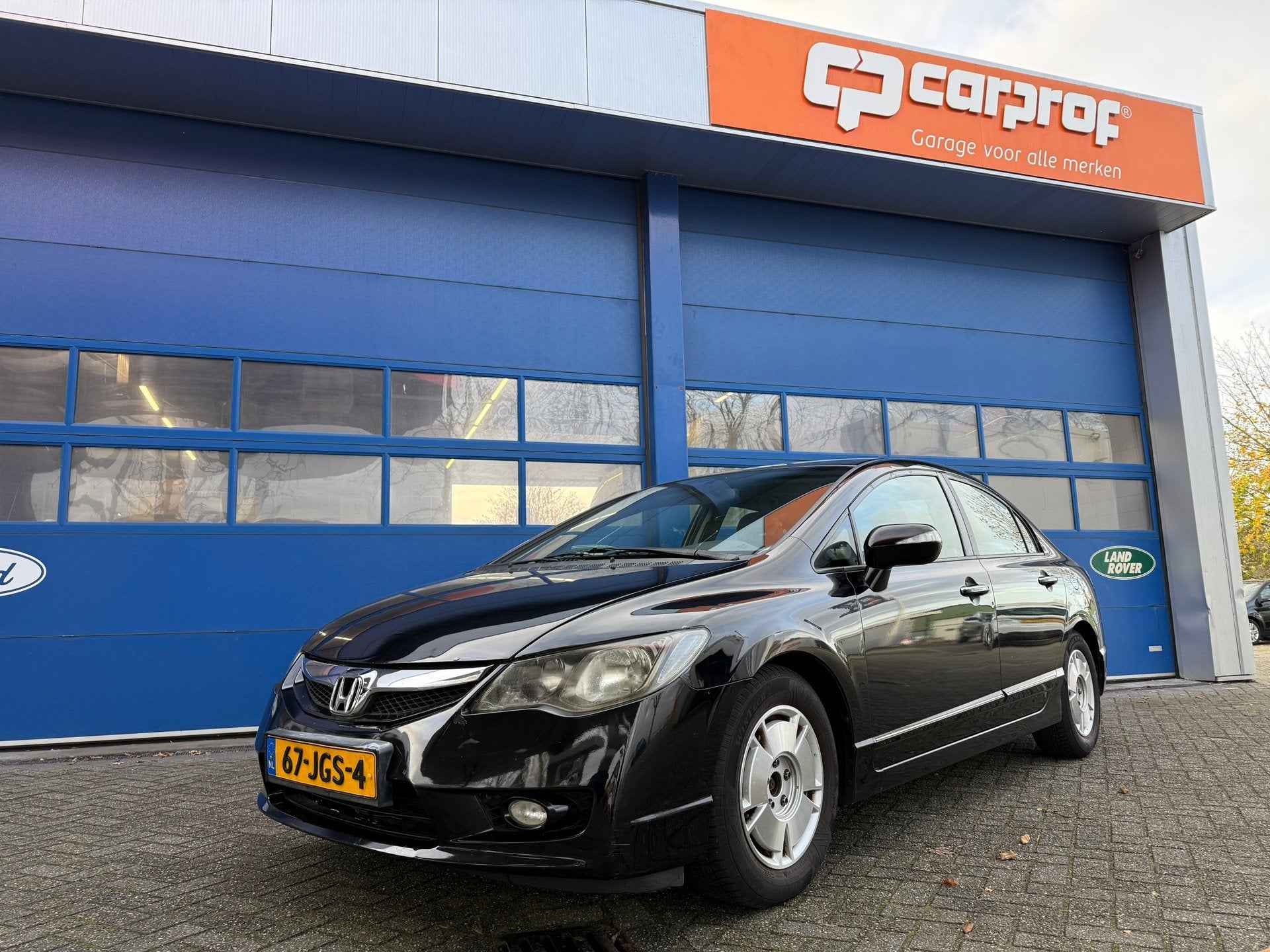 Honda Civic 1.3 Hybrid, Auto's, Stof, Gebruikt, Zwart, Metallic lak