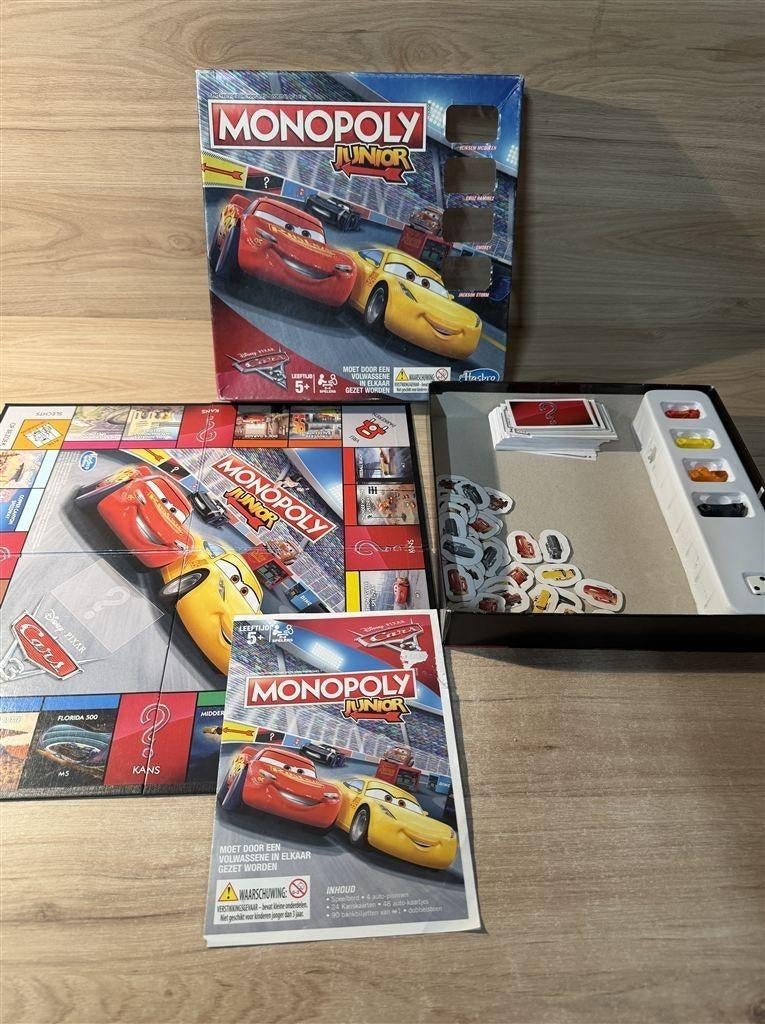 Monopoly junior Cars 3 - s6691, Hobby en Vrije tijd, Gezelschapsspellen | Bordspellen, Verzenden, Zo goed als nieuw
