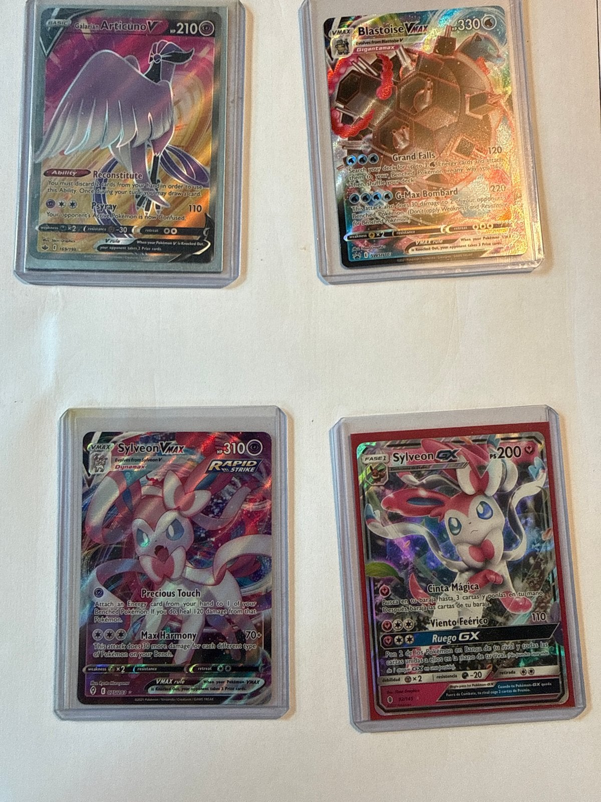Zeldzame Pokémon kaarten - Articuno, Blastoise, Sylveon, Pik, Ophalen of Verzenden, Zo goed als nieuw, Meerdere kaarten, Foil