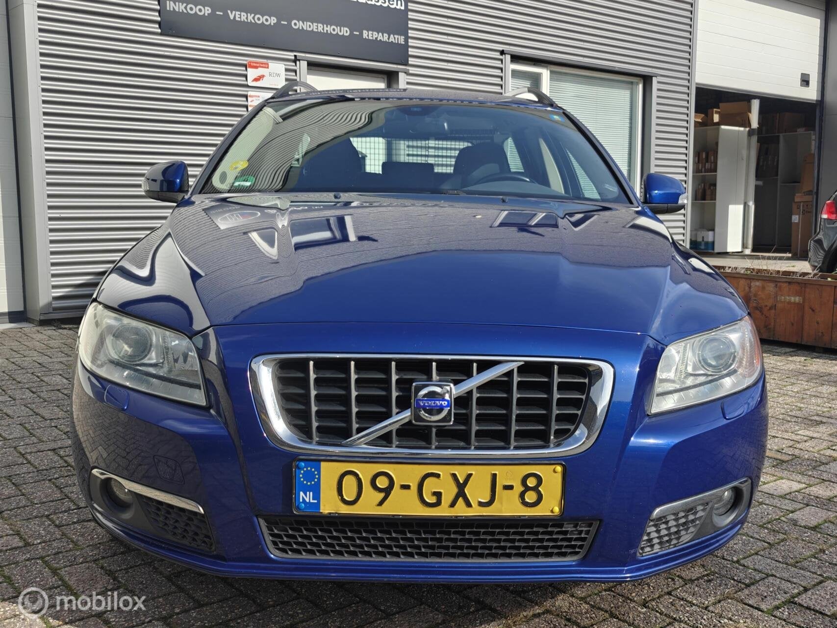 Volvo V70 2.5T Automaat Ocean Race Volleder Trekhaak Parkeer, Auto's, Dealer onderhouden, 1800 kg, 1573 kg, Blauw