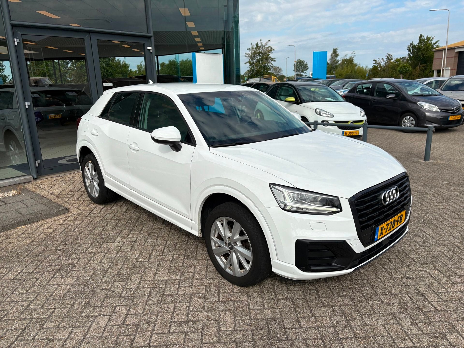 Audi Q2 1.0 TFSI Sport Pro Line S, Auto's, Stof, Gebruikt, 116 pk, Wit