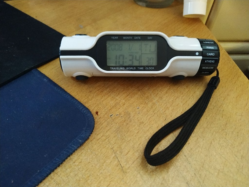 LED Digitale zaklamp in zakformaat met wereldtijdklok, Ophalen of Verzenden, Zo goed als nieuw, Batterij