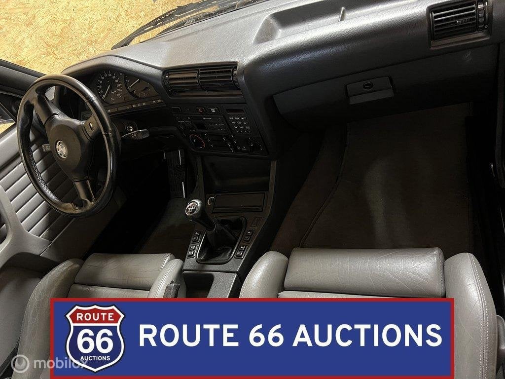 BMW 325i Cabriolet E30 | 1992 | Route 66 Auctions, Overige carrosserieën, Zwart, Bedrijf, Handgeschakeld