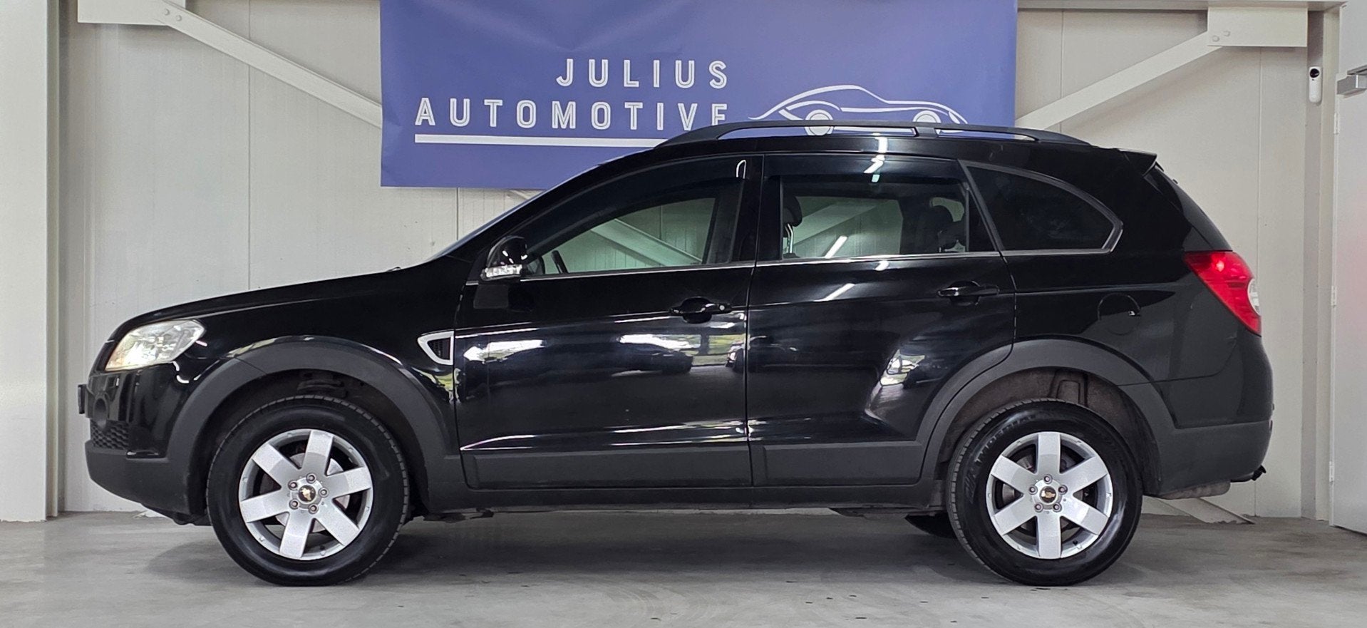Chevrolet Captiva 2.4i 7P Executive Volledig Onderhouden Lee, Auto's, 136 pk, Gebruikt, Zwart, 4 cilinders
