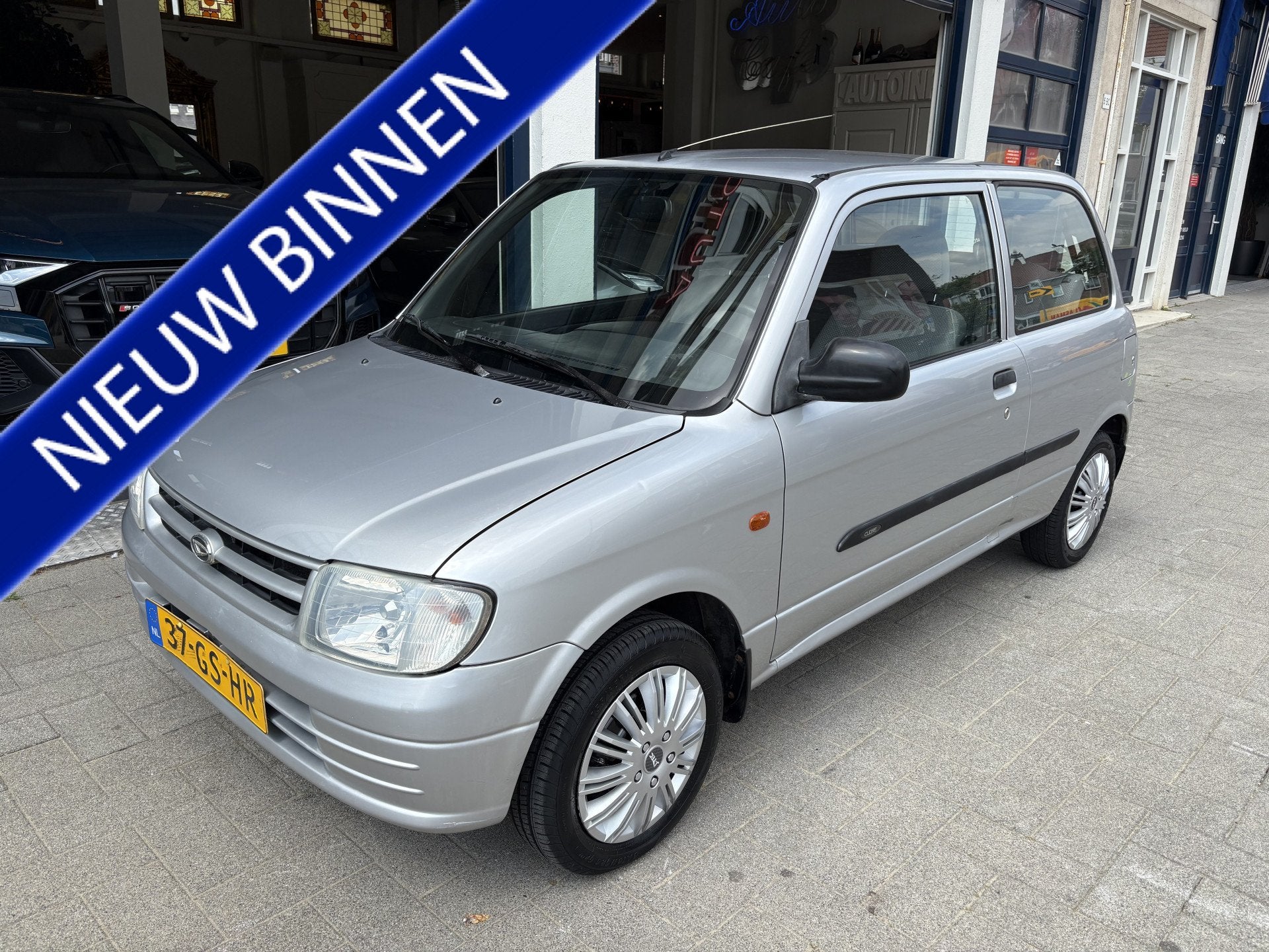 Daihatsu Cuore 1.0-12V XTi AUTOMAAT/NAP/NW APK 06-2027, 15 km/l, 4 stoelen, Origineel Nederlands, Zilver of Grijs