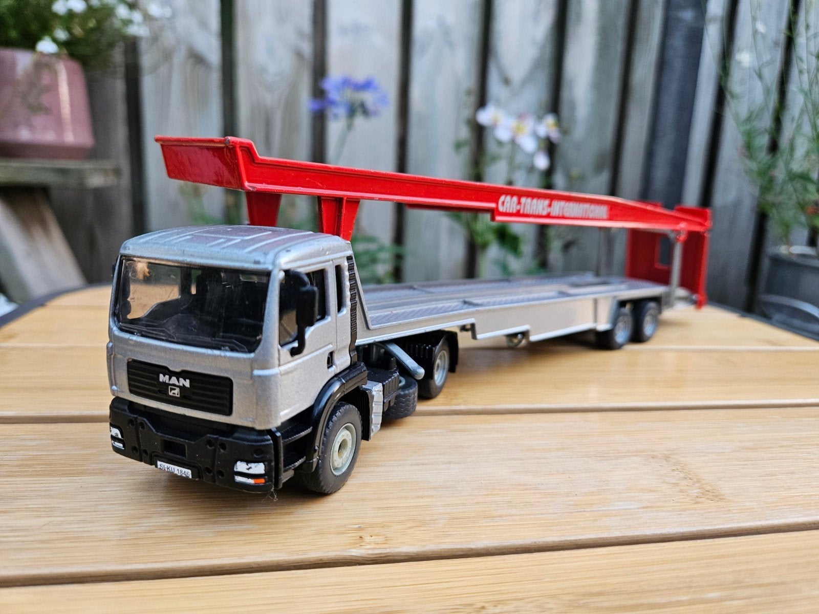 Siku MAN Autotransport grijs rood 1:55, Hobby en Vrije tijd, Ophalen of Verzenden, Zo goed als nieuw, Bus of Vrachtwagen, SIKU