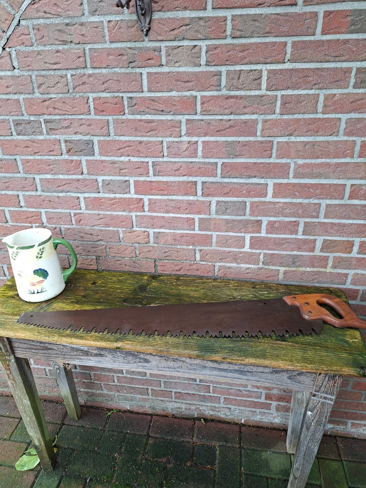 ouderwetse boomzaag, Ophalen