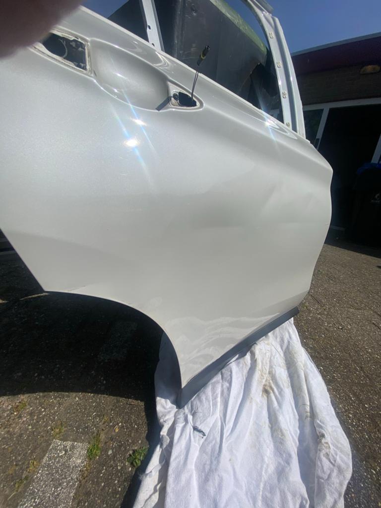 BMW F48 rechter achterdeur - schade herstelbaar, Gebruikt, Deur, Ophalen of Verzenden, Achter