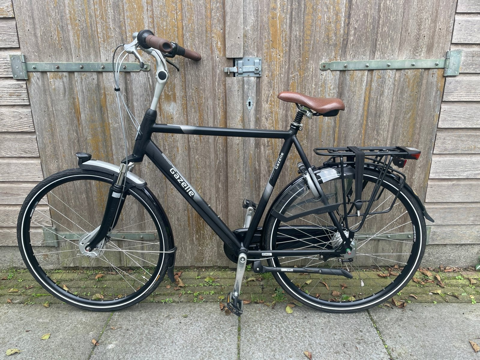 Batavus oranje c7 plus heren fiets 28 inch 7 versnellingen, Ophalen, Versnellingen, Zo goed als nieuw, 61 tot 65 cm