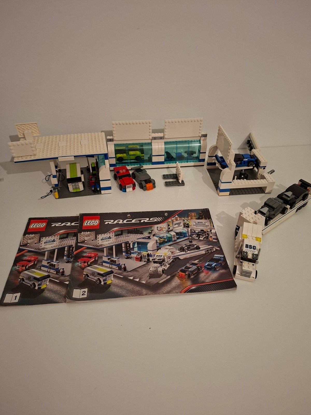 Lego racers garage 8154 compleet met boekjes, Gebruikt, Lego, Ophalen of Verzenden, Racers