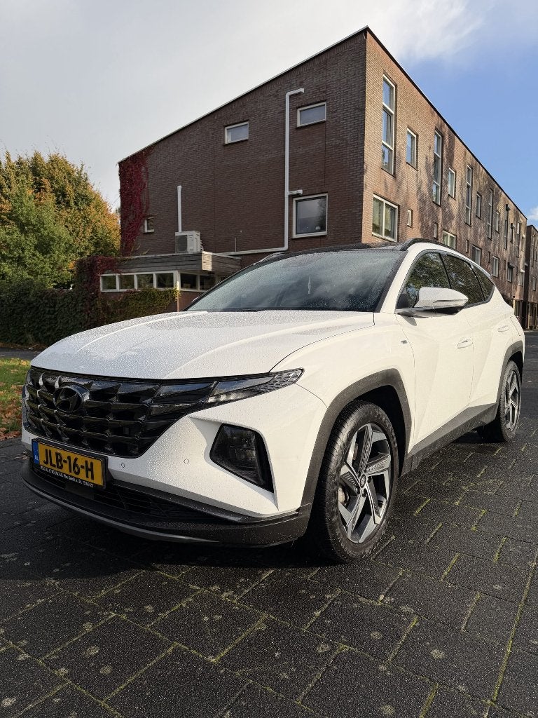 Hyundai Tucson Premium Sky Aut. | Pano | 360 cam | Garantie, Auto's, Zwart, 4 cilinders, 1650 kg, Wit
