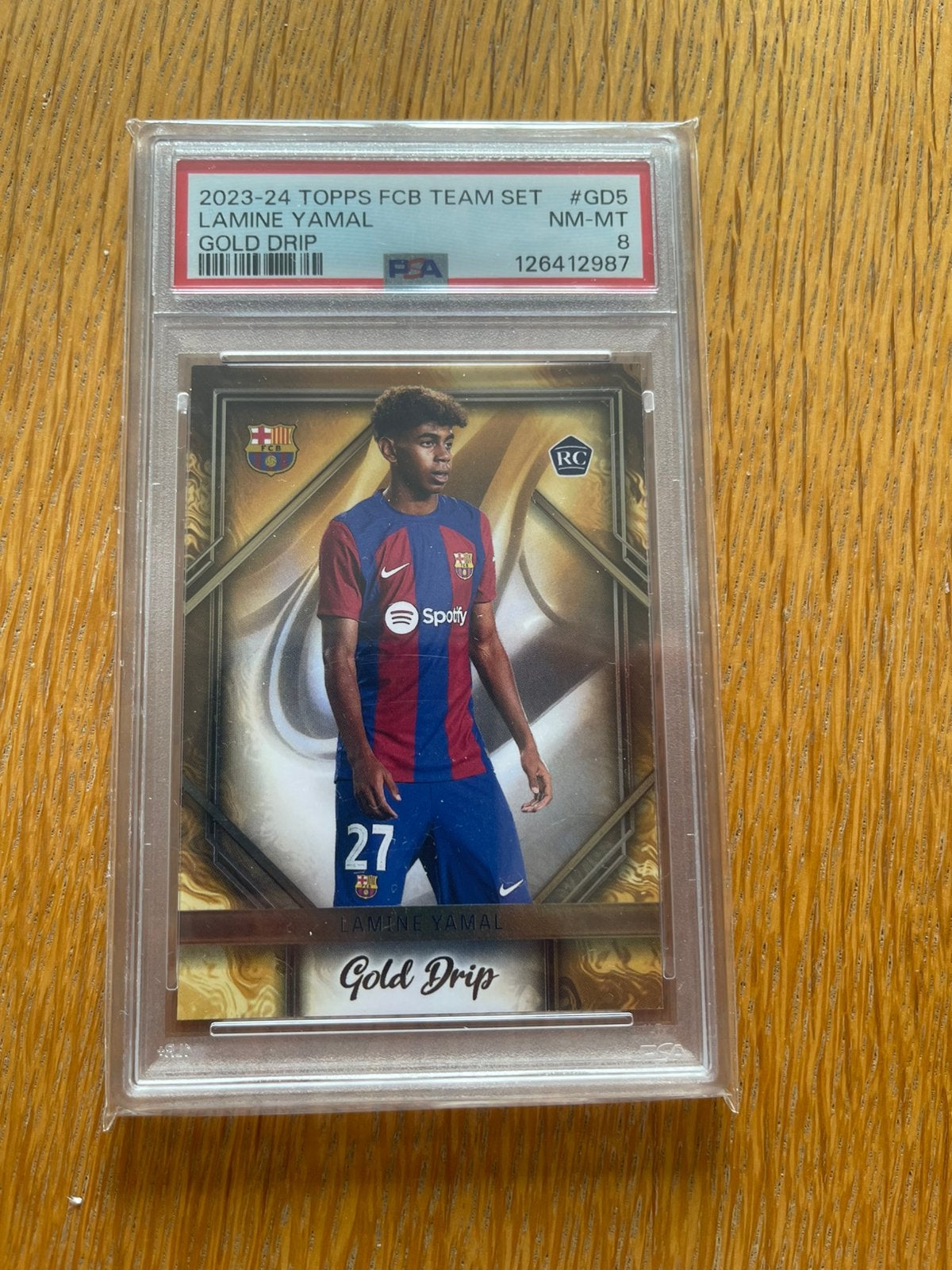 Lamine Yamal Rookie card PSA 8 Gold Drip Topps, Ophalen of Verzenden, Zo goed als nieuw, Plaatje