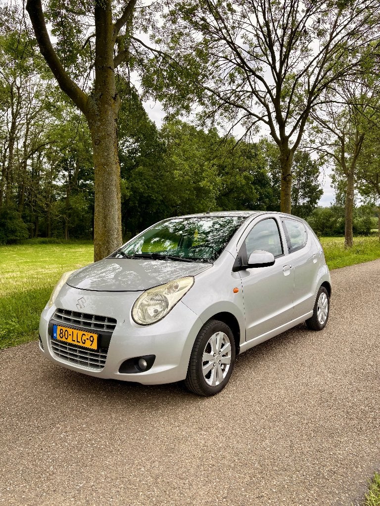 Suzuki Alto 1.0 Exclusive met Airco en toerenteller, Auto's, Voorwielaandrijving, Stof, 200 kg, 4 stoelen