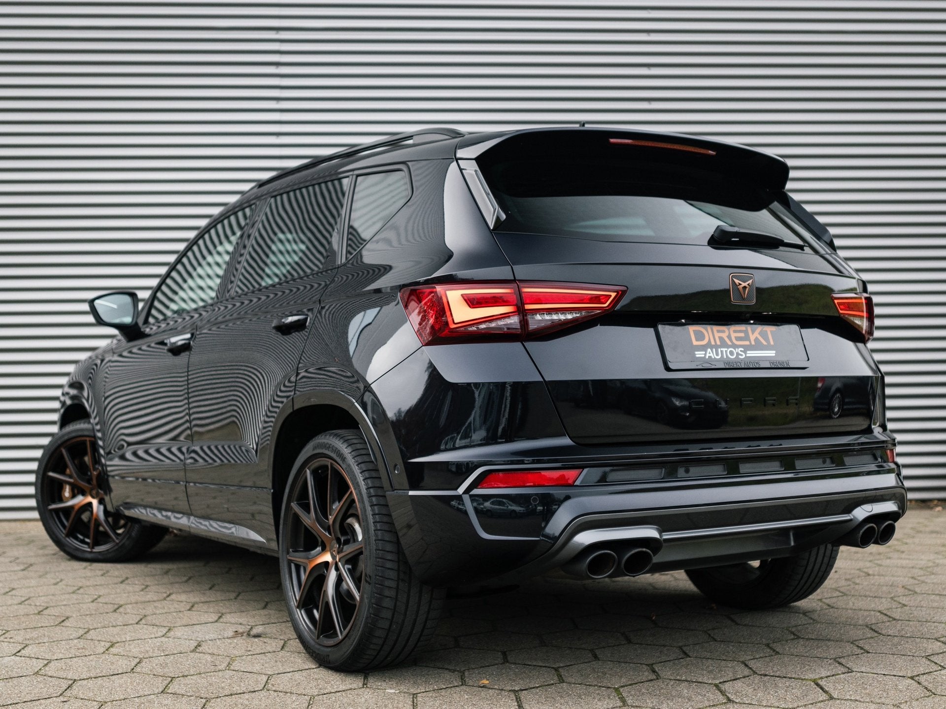 CUPRA Ateca 2.0 TSI 4DRIVE PANO BREMBO BEATS TREKHAAK CAMERA, Auto's, Automaat, Dealer onderhouden, Gebruikt, Zwart