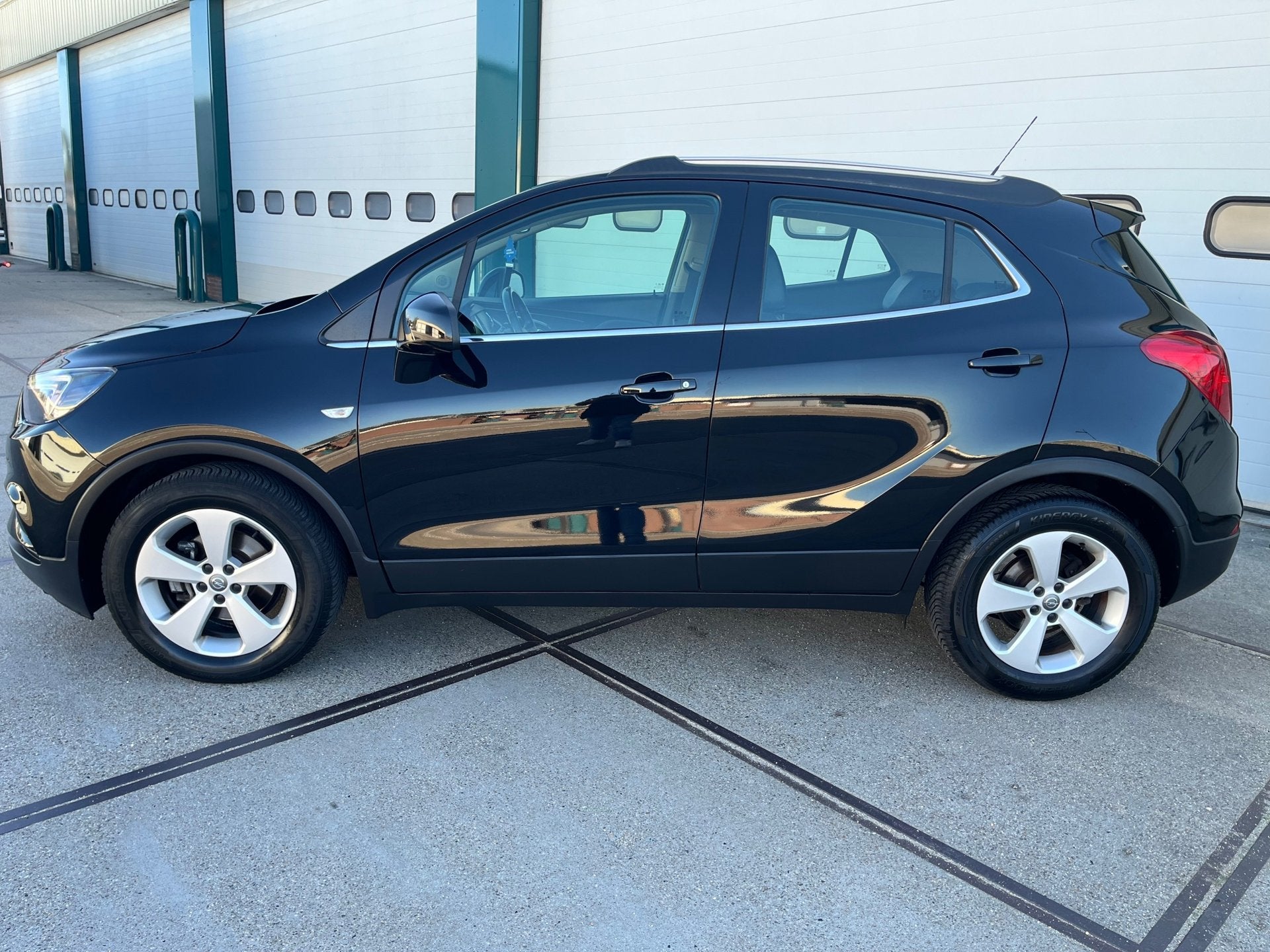 Opel Mokka X 1.4 Turbo Black Edition Nieuwstaat., Auto's, Dealer onderhouden, 15 km/l, Gebruikt, Leder en Stof