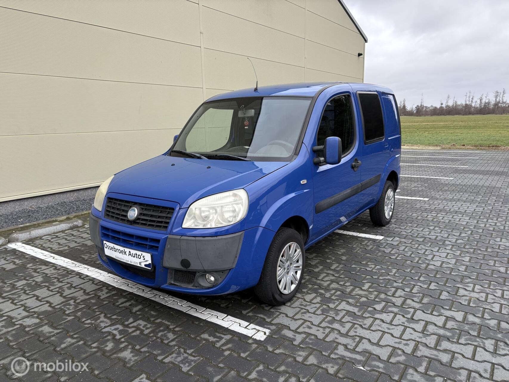 Fiat Doblo Benzine Airco 125dkm Schuifdeur 2007, Auto's, Bestelauto's, Voorwielaandrijving, Gebruikt, Blauw, Bedrijf