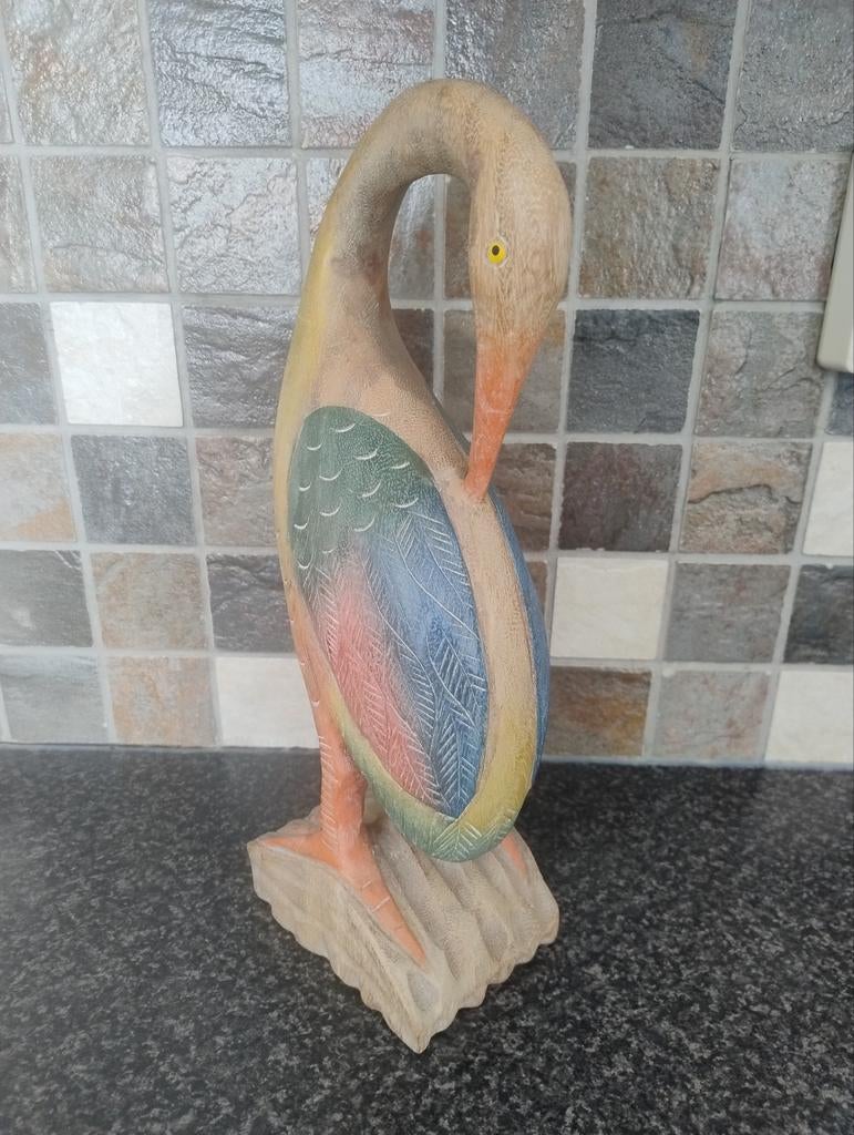 Houten beeld eend, Ophalen