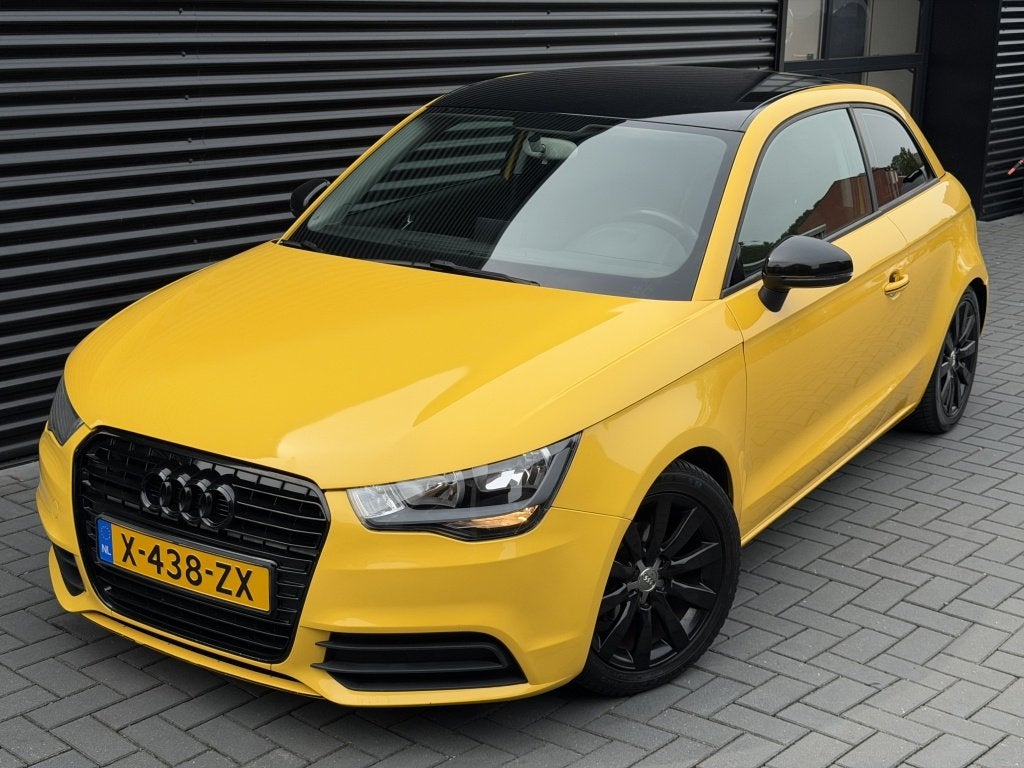 Audi A1 1.2 TFSI Attraction| GEEL| VERLAAGD| UNIEK| LM| NAVI, Auto's, Euro 5, Zwart, 4 cilinders, 4 stoelen