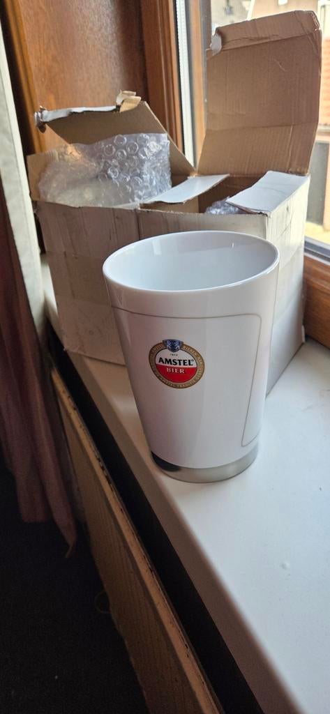 Amstel Bier Afschuim Houder, Ophalen