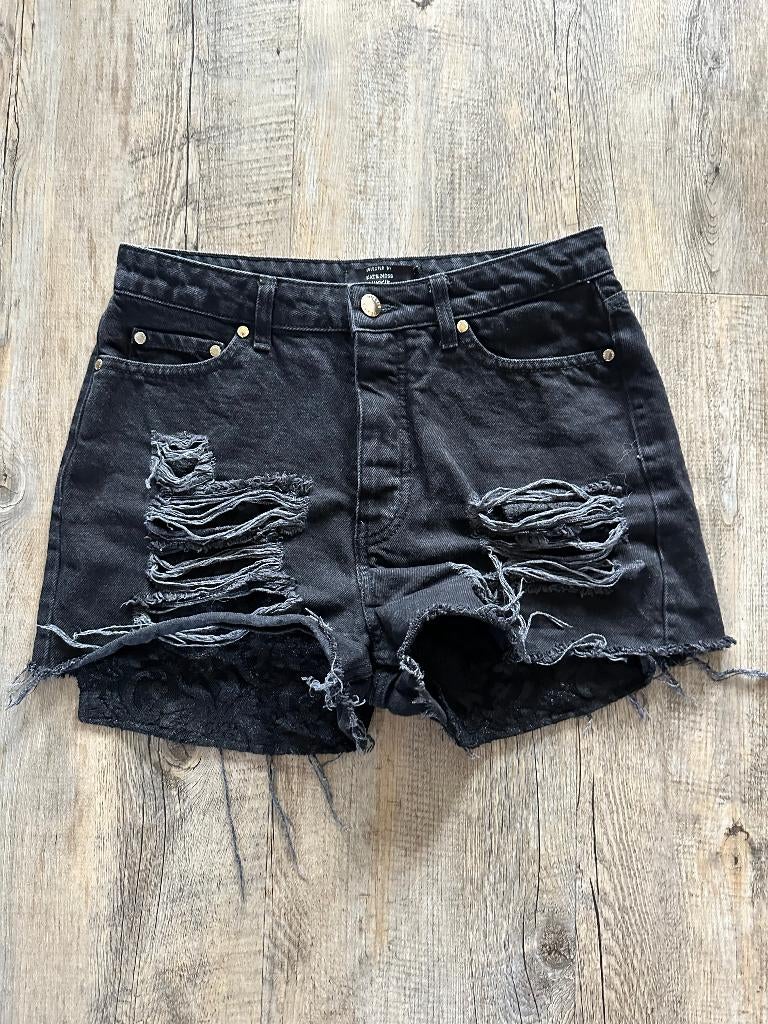 Zwart Nikkie spijkerbroekje, maat 28, ZGAN!, Kleding | Dames, Zwart, Ophalen of Verzenden, Zo goed als nieuw, Nikkie
