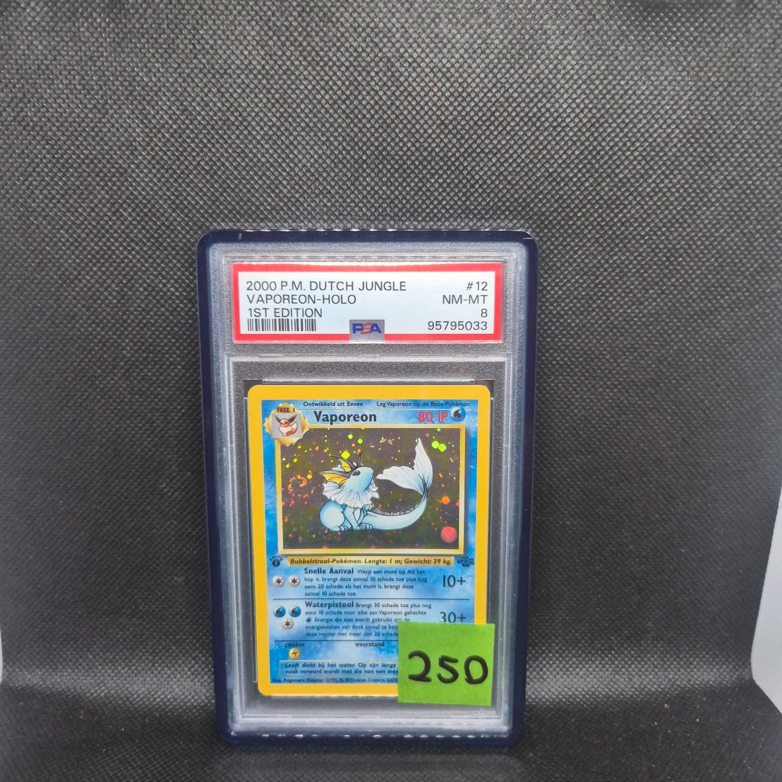 Vaporeon Holo 1st Edition NL Jungle PSA 8, Ophalen of Verzenden, Zo goed als nieuw