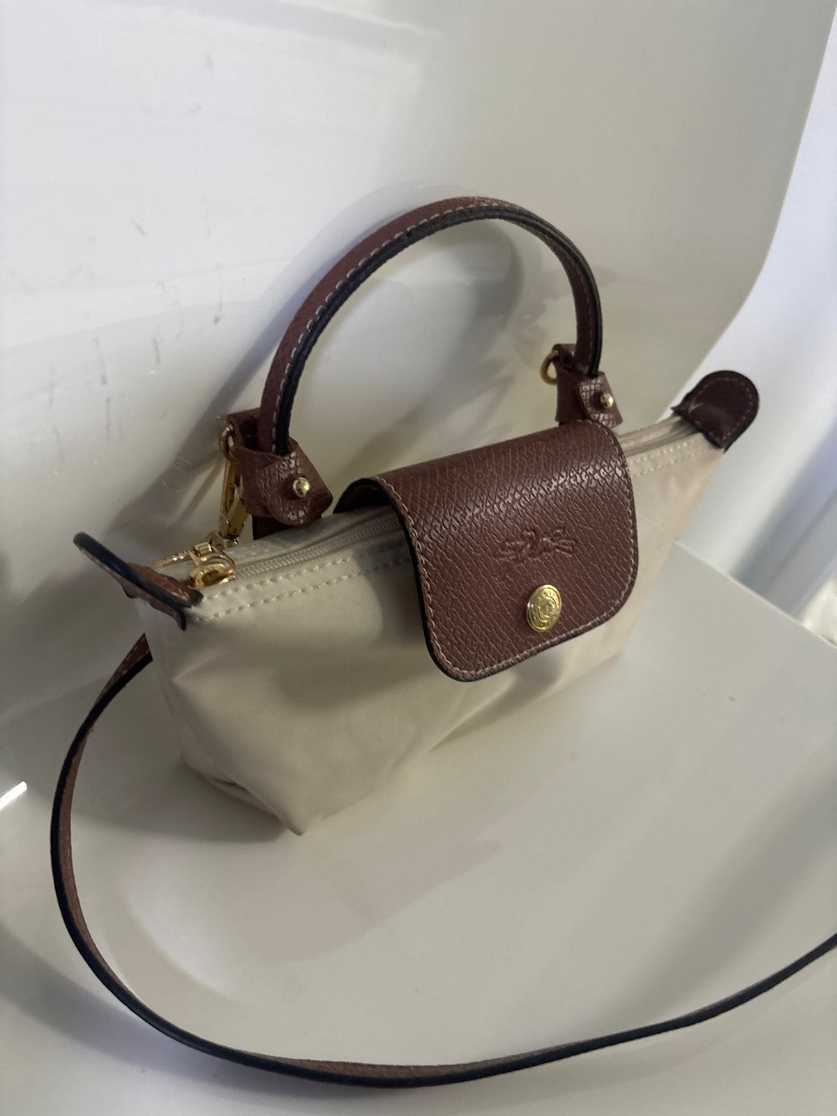 Longchamp Le Pliage Mini Handtasje Beige/Bruin, Sieraden, Tassen en Uiterlijk, Tassen | Damestassen, Ophalen, Zo goed als nieuw