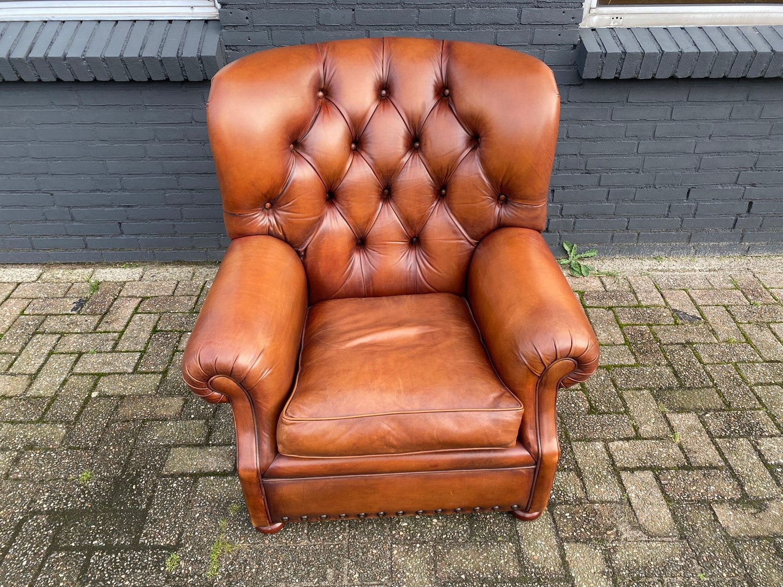 XL Chesterfield fauteuil cognac in nieuwstaat!, Huis en Inrichting, Fauteuils, Ophalen, Zo goed als nieuw, 75 tot 100 cm