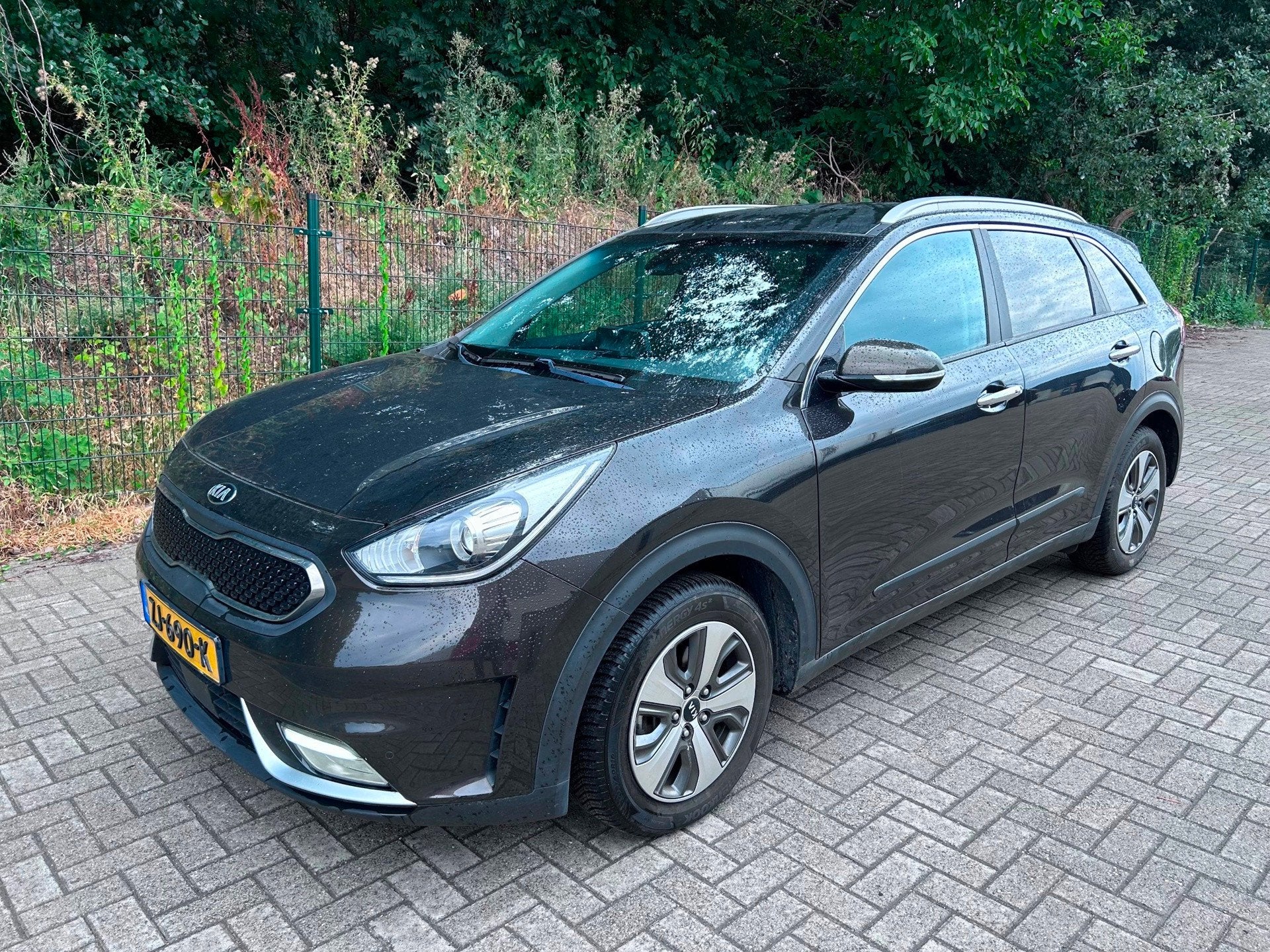 Kia Niro 1.6 GDi Hybrid DynamicPlusLine Keyless Leer, Auto's, Gebruikt, Bruin, Automatische klimaatregeling, 1390 kg