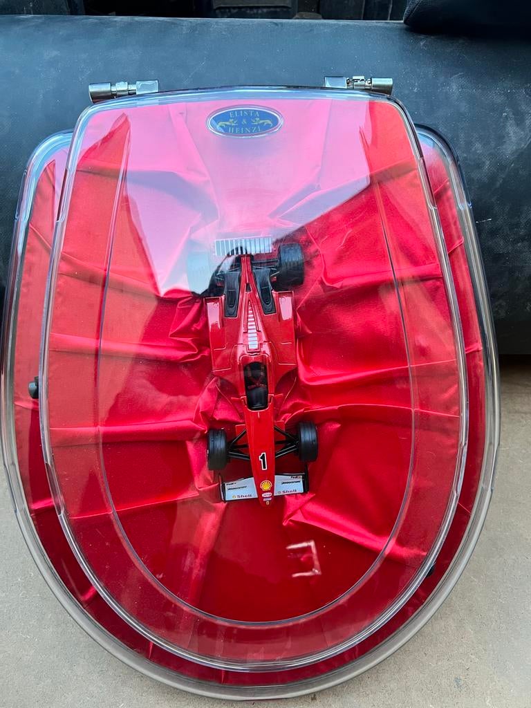 WC bril Ferrari collectors item, Verzamelen, Automerken, Motoren en Formule 1, Ophalen, Gebruikt, Formule 1