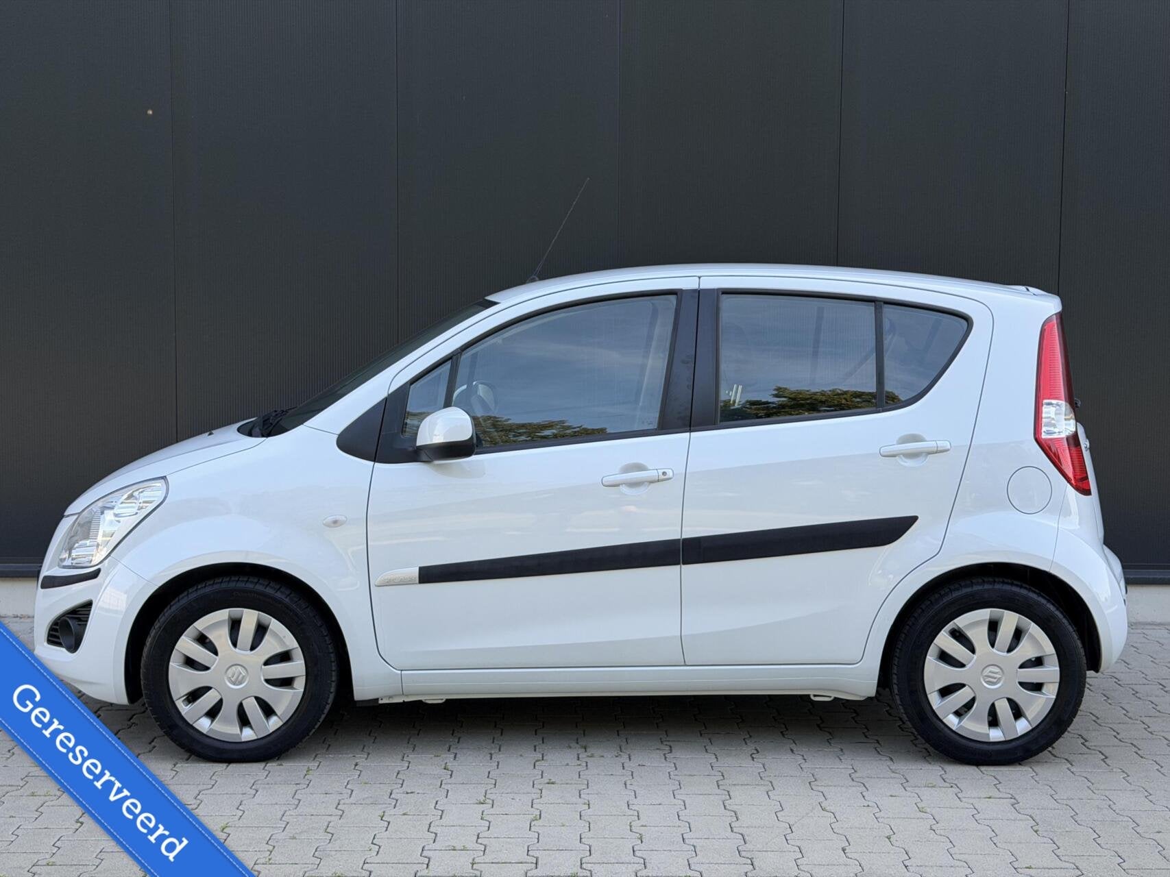Suzuki Splash 1.2 Comfort EASSS 1E Eigen Airco Parelmoer NL, Auto's, Suzuki, Voorwielaandrijving, Stof, 4 cilinders, Wit