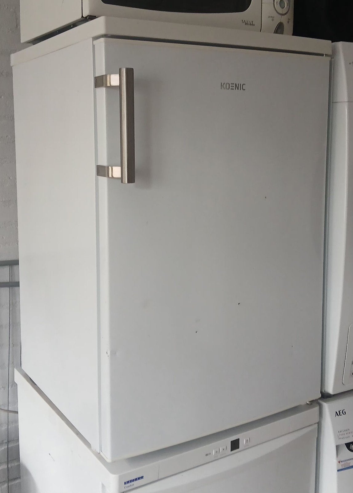 Koenic koelkast 120L (107L koelkast / 13L vriesvak), Gebruikt, 45 tot 60 cm, Met vriesvak, Ophalen